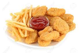 Chicken Nuggets with Fries — crispy nuggets and fries with ketchup